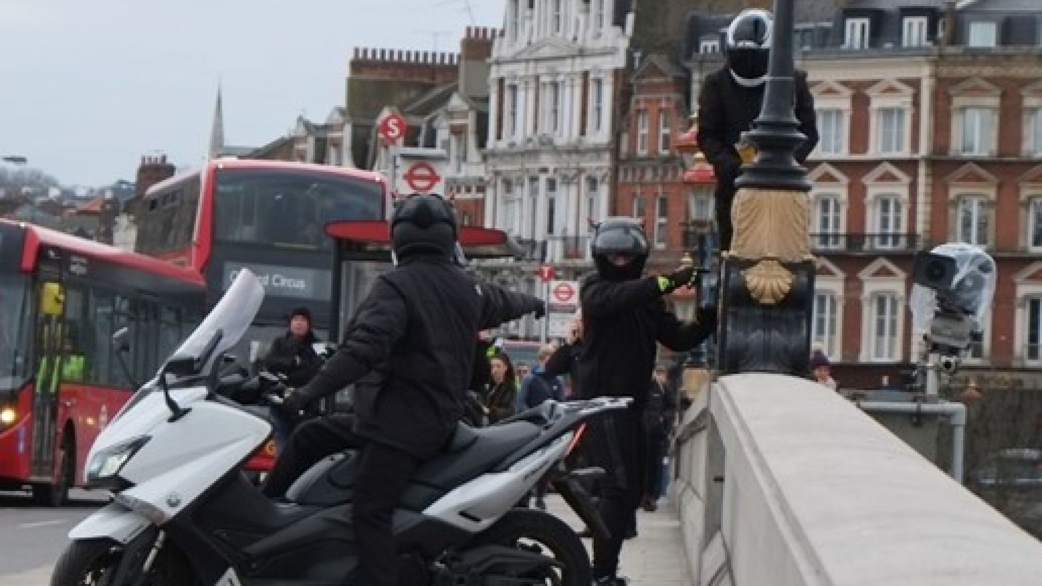 Moped stop traffic and attempt to steal cameras estimated to be worth £180,000