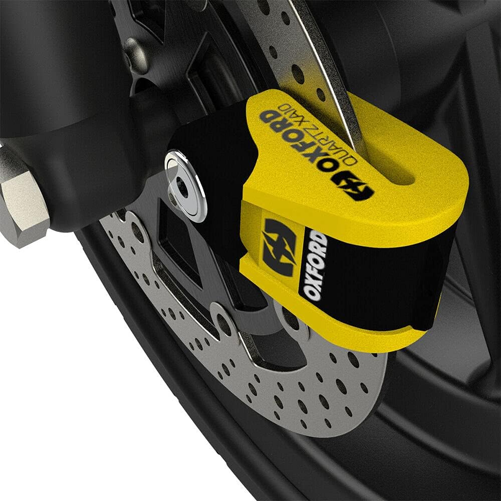 the oxford screamer disc lock fitted to a motorcycle brake disc