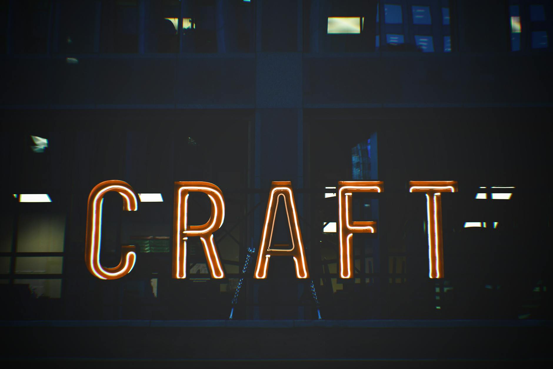 a neon sign of the word craft